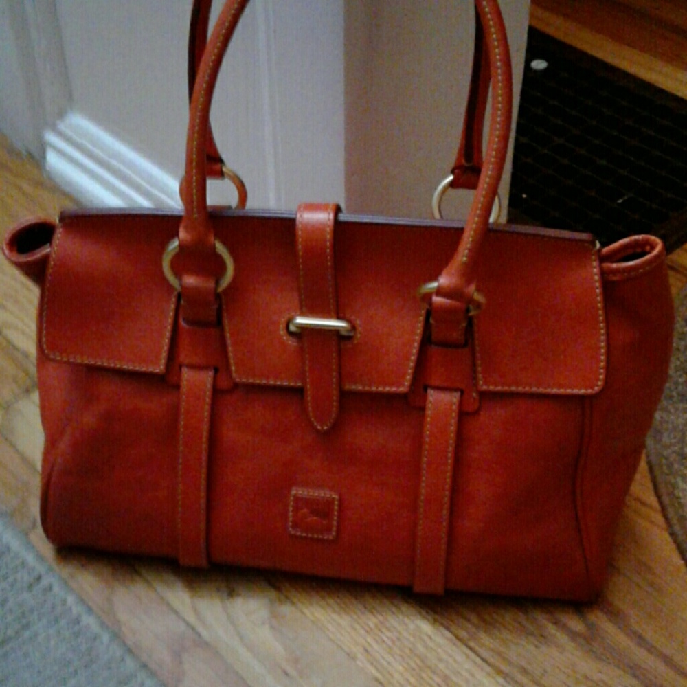 Dooney & Bourke roll tab